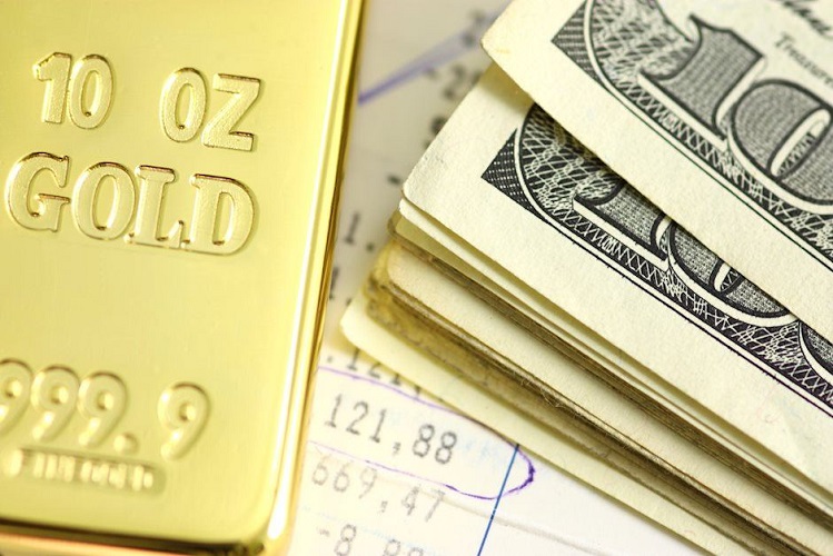 توقعات الذهب والدولار بعد تلميحات الفيدرالي القوية